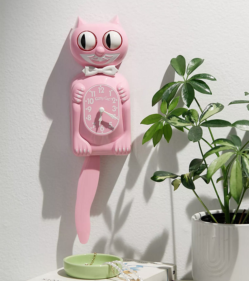 L'avant gardiste Kit-Cat horloge chat rose chewing-gum