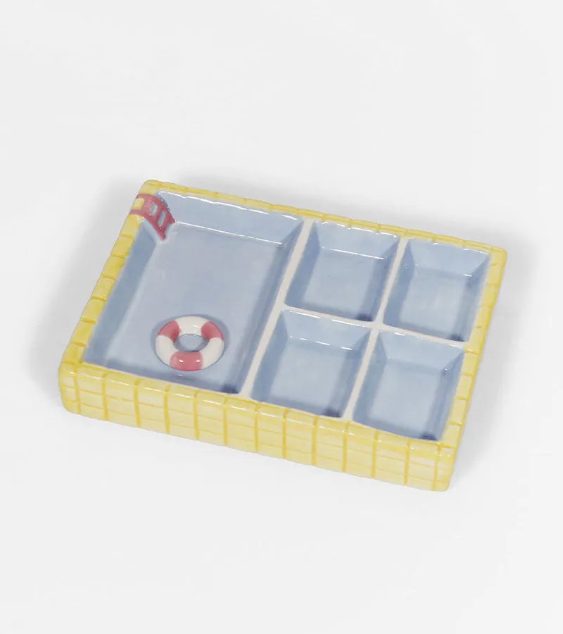 Piscine repose-bijoux plateau bagues forme piscine