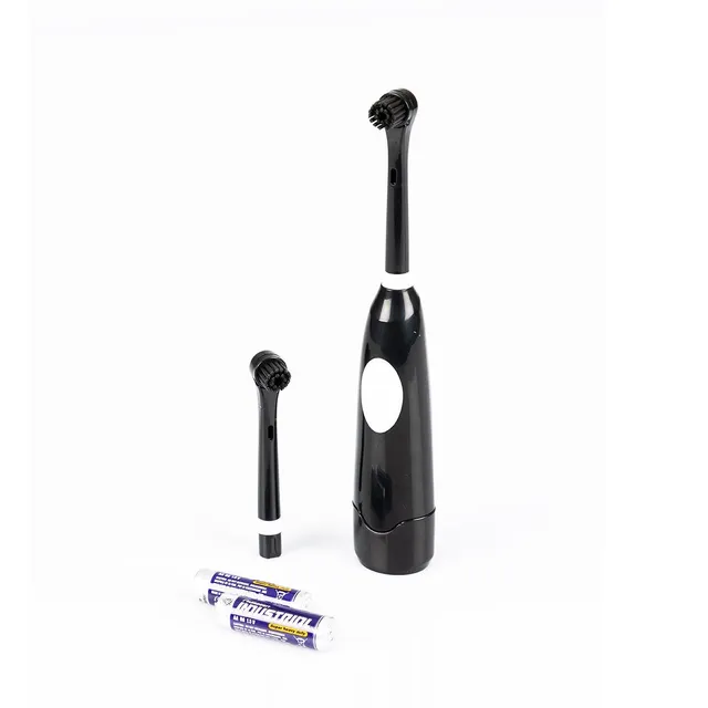 Brosse à dents électrique noire à piles AA voyage