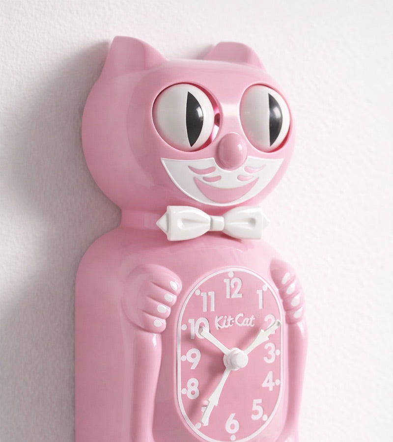 L'avant gardiste Kit-Cat horloge chat rose chewing-gum