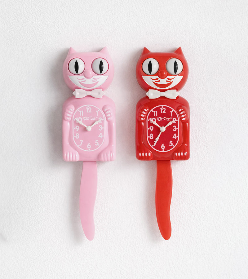 L'avant gardiste Kit-Cat horloge chat rose chewing-gum